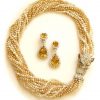 A Diamond, Colored Diamond and Pearl Torsade by Trio - Image 3