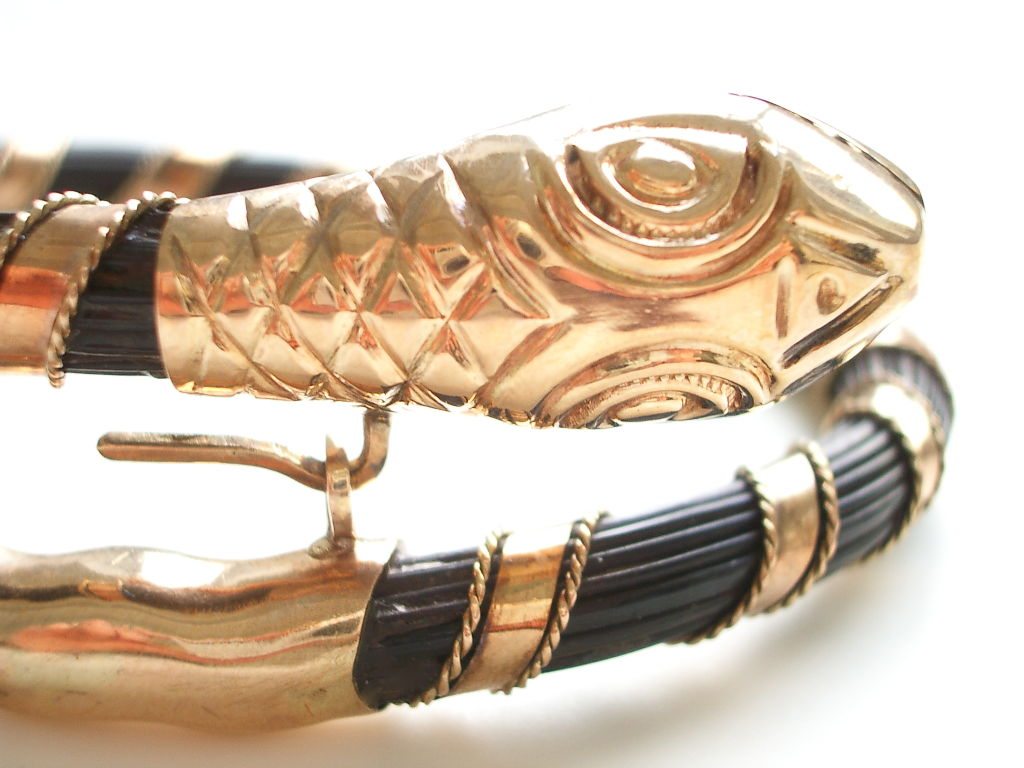 Sold at Auction: 14K YG & Elephant Hair Bangle Bracelet