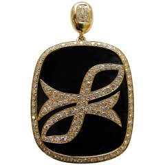 A French Gold , Diamond and Onyx Pisces Pendant